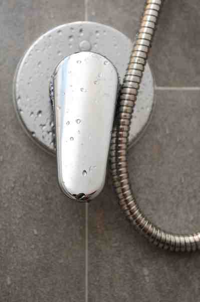 how to remove a stuck delta shower faucet handle