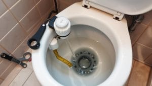 how to raise water level in toilet bowl